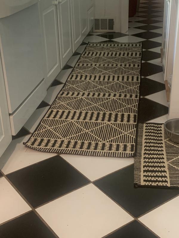 Customer photo for review titled "Black and white patterned rug"