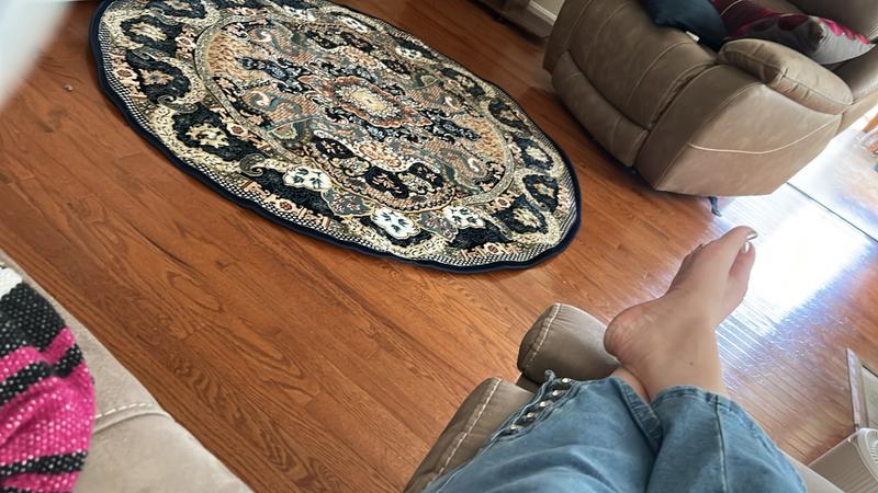 Customer photo for review titled "5’round Navy for living area"