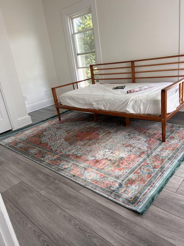 Customer photo for review titled "This Rug really brings a room together!"