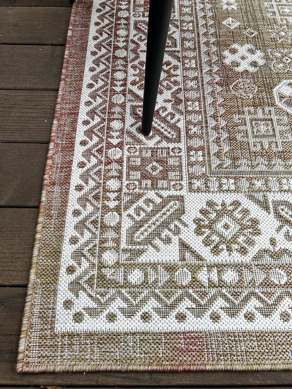 Customer photo for review titled "Great rug but color fades significantly"
