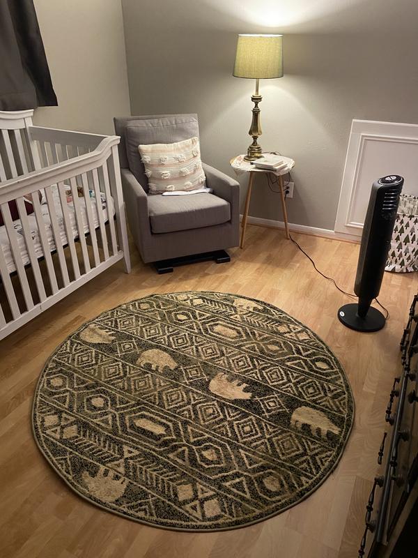 Customer photo for review titled "Perfect rug for my son’s nursery"