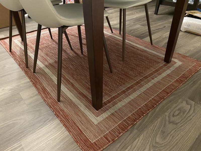 Customer photo for review titled "Great rug for dining room!"