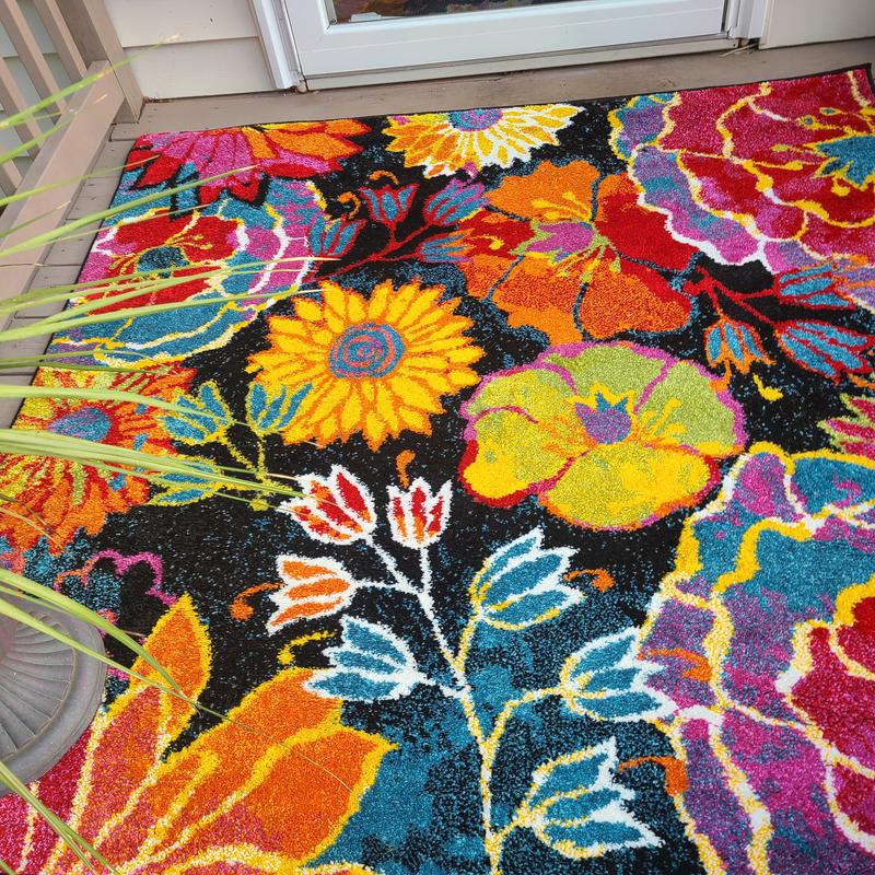 Customer photo for review titled "Brilliant colorful rug"