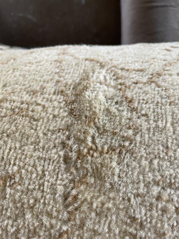 Customer photo for review titled "Oh darn a defect on my beautiful rug."