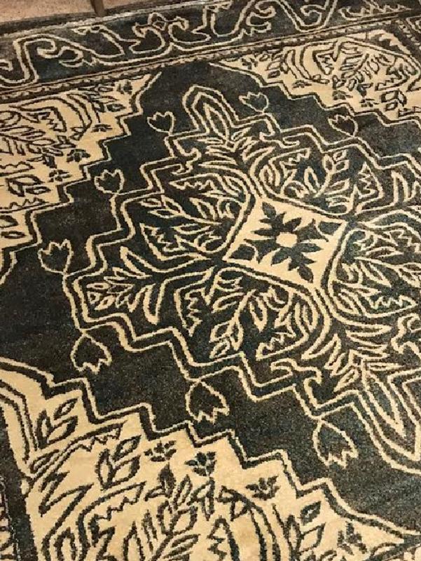 Customer photo for review titled "Picture lighter than actual rug"