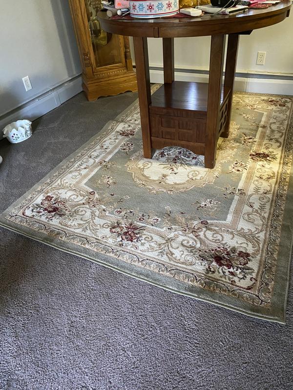 Customer photo for review titled "My dining room rug"