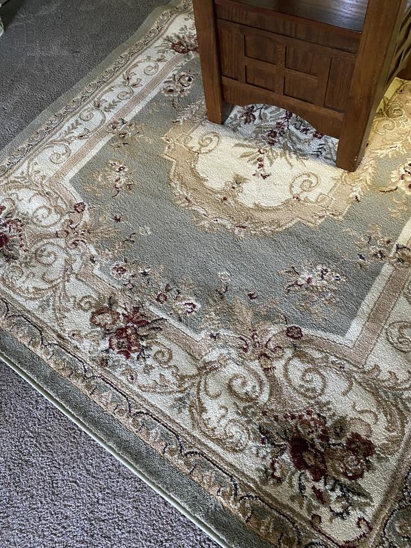 Customer photo for review titled "My dining room rug"