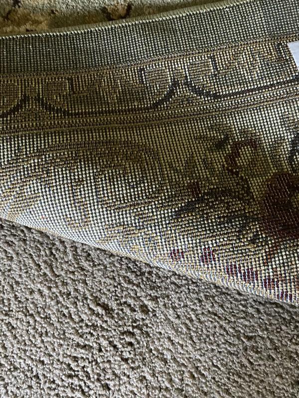 Customer photo for review titled "My dining room rug"