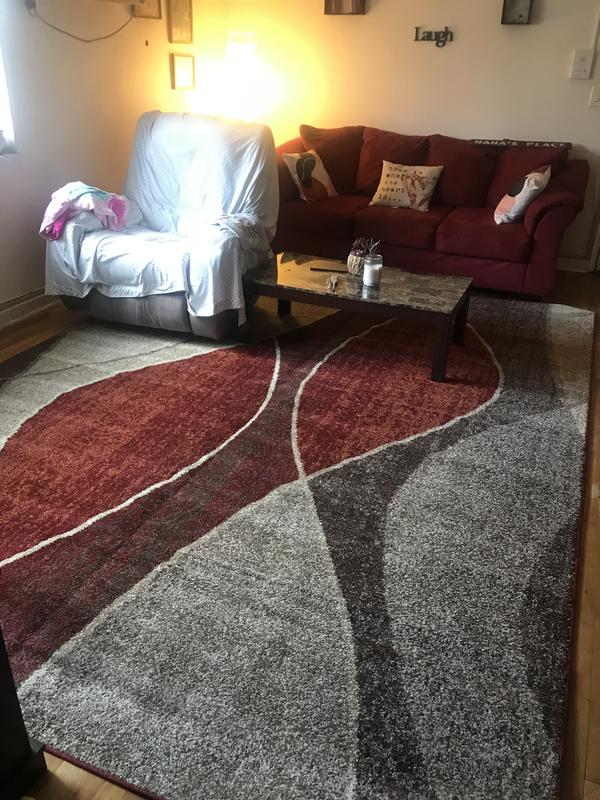 Customer photo for review titled "The rug was beautiful. Matched my furniture perfec"