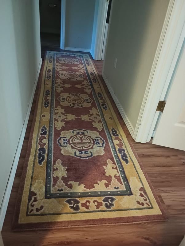 Customer photo for review titled "Easy to use soft and adds cushion to the rug"