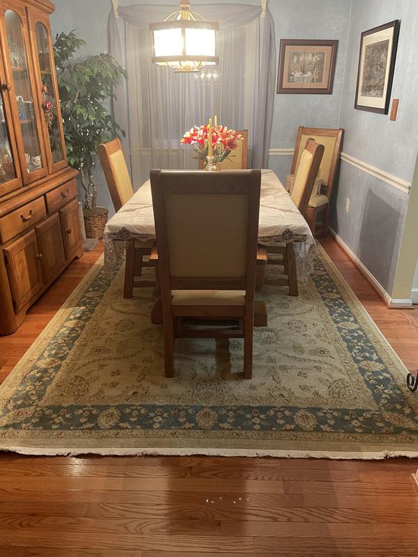 Customer photo for review titled "Nice rug for the dining room"
