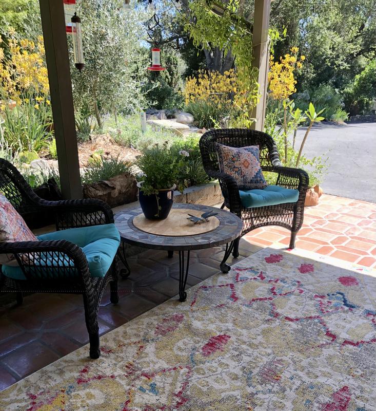 Customer photo for review titled "Pretty rug steals the show."