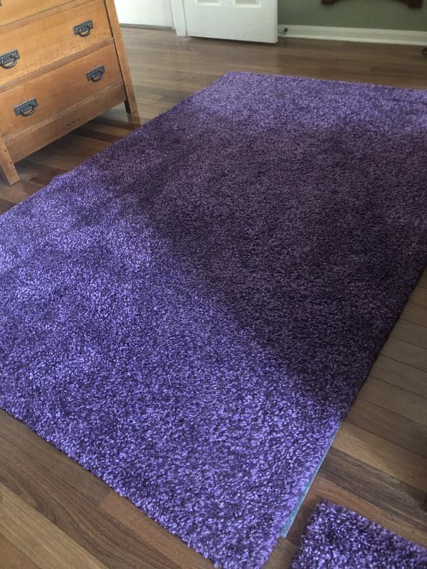 Customer photo for review titled "Colorful unique rugs!"