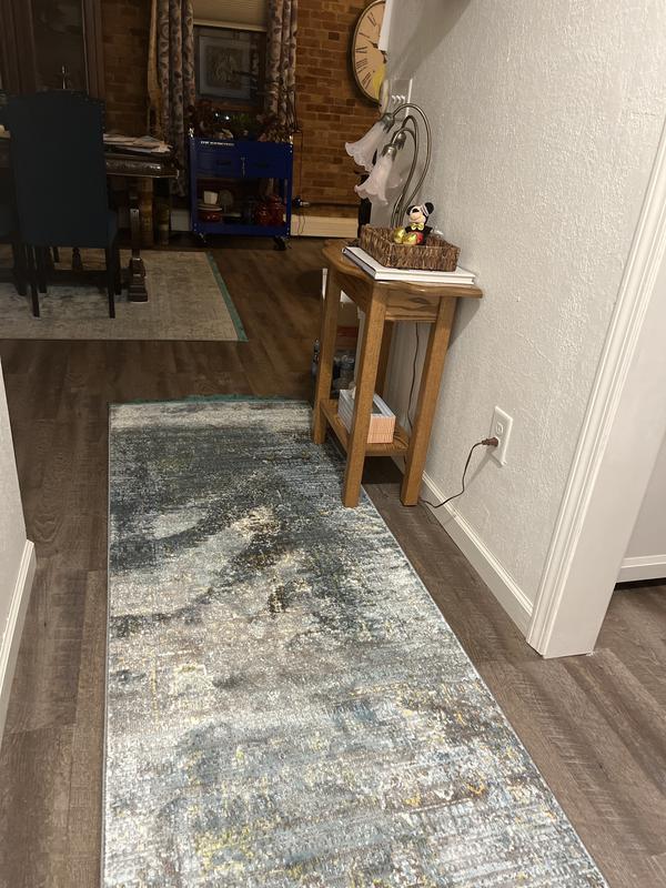 Customer photo for review titled "Dog ate the rug!  Rugs.com saved the day."