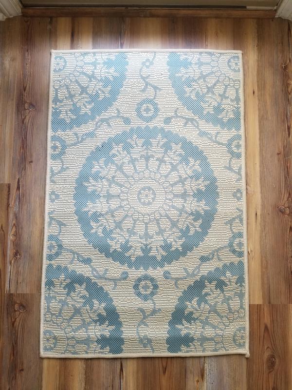 Customer photo for review titled "Great outdoor/indoor washable mats!!"