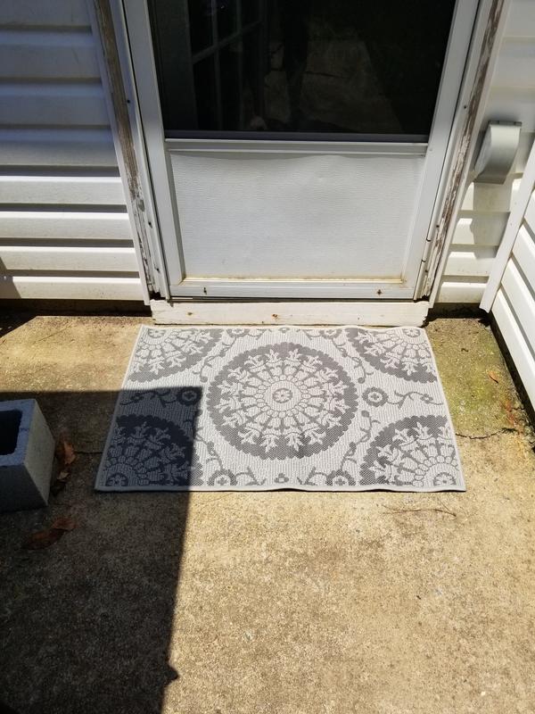 Customer photo for review titled "Great outdoor/indoor washable mats!!"