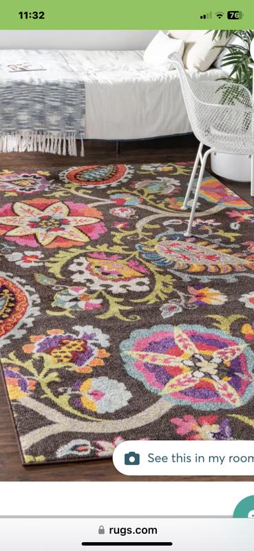Customer photo for review titled "Quality Rug and colorful"