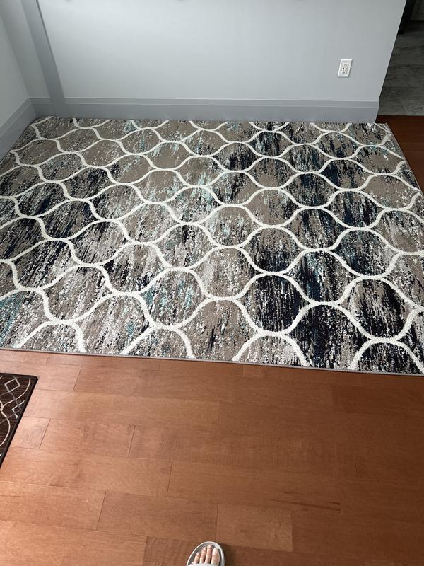 Customer photo for review titled "This rug a good quality for dining room."