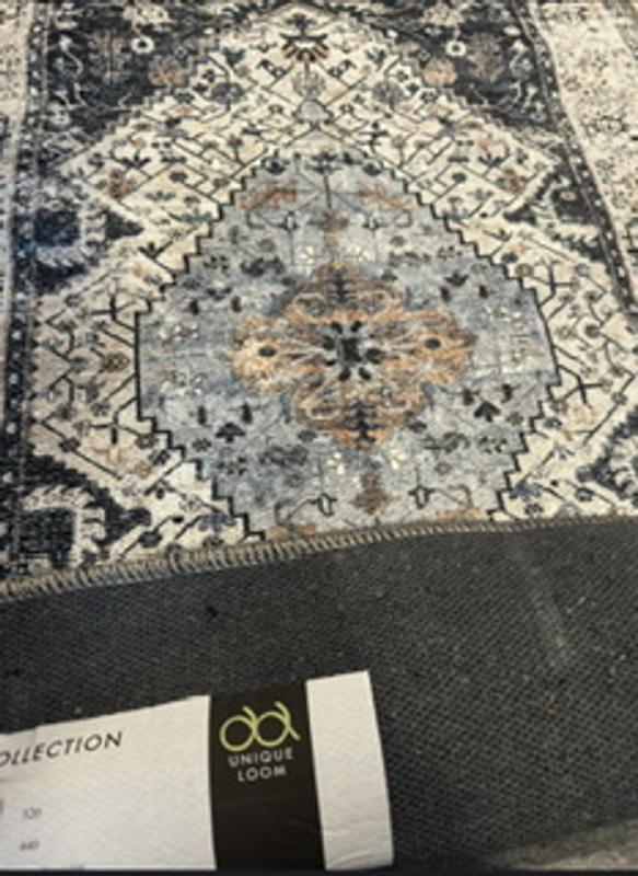 Customer photo for review titled "Soft rug colors all wrong"