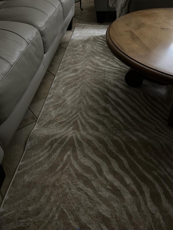 Customer photo for review titled "White on white Zebra rug. Very nice quality"