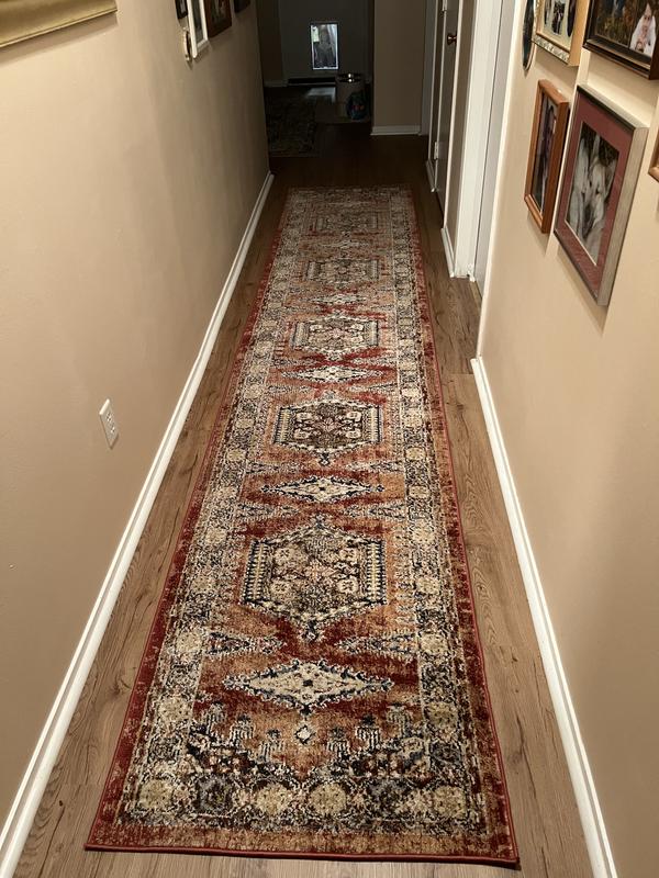 Customer photo for review titled "Am very happy with my terracotta Eden rug!"