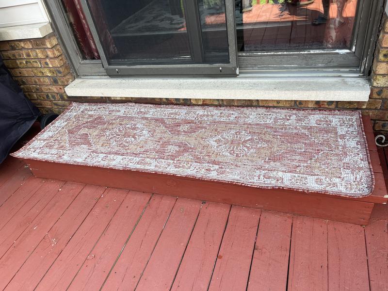 Customer photo for review titled "Rug for door atoop"