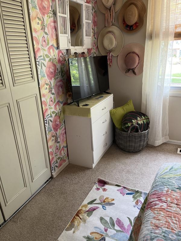 Customer photo for review titled "Floral carpet"