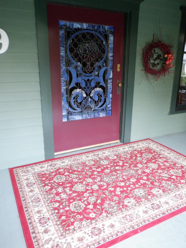 Customer photo for review titled "Front porch door rug"