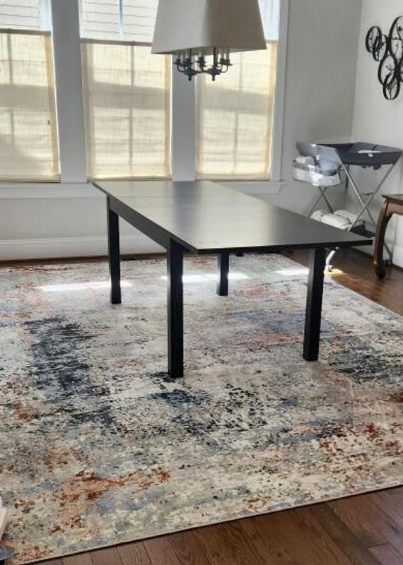 Customer photo for review titled "Dining room rug"