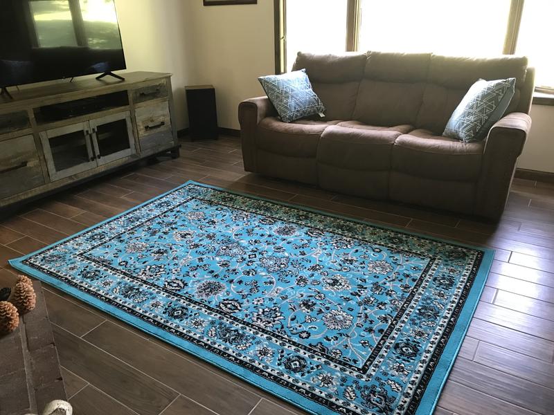 Customer photo for review titled "The color brightens up this dark wood."