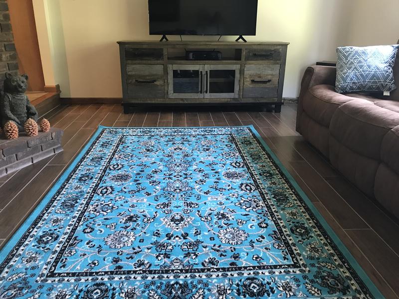 Customer photo for review titled "The color brightens up this dark wood."