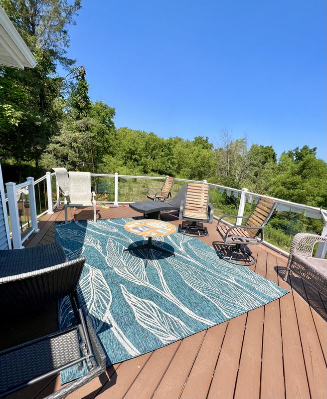 Customer photo for review titled "Excellent outdoor rug for our back porch!"