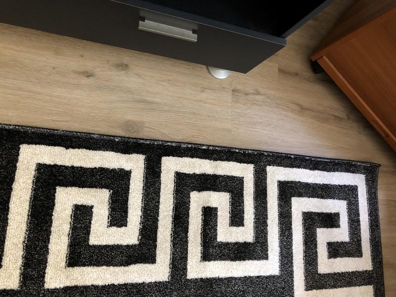 Customer photo for review titled "Rug is beautiful but..."