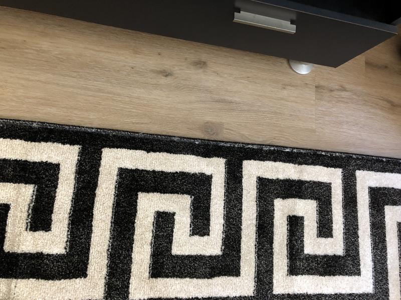 Customer photo for review titled "Rug is beautiful but..."