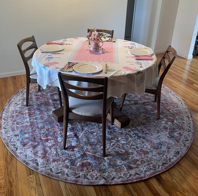 Customer photo for review titled "Round  Rug Added Variety"