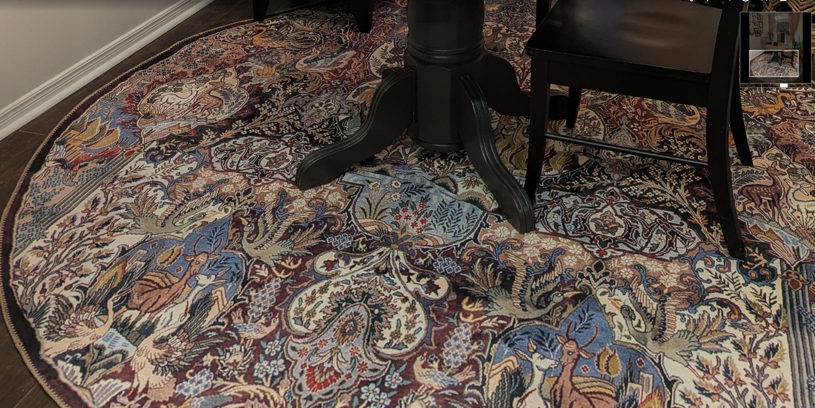 Customer photo for review titled "An image of a good rug stretched and printed on a cheap rug"