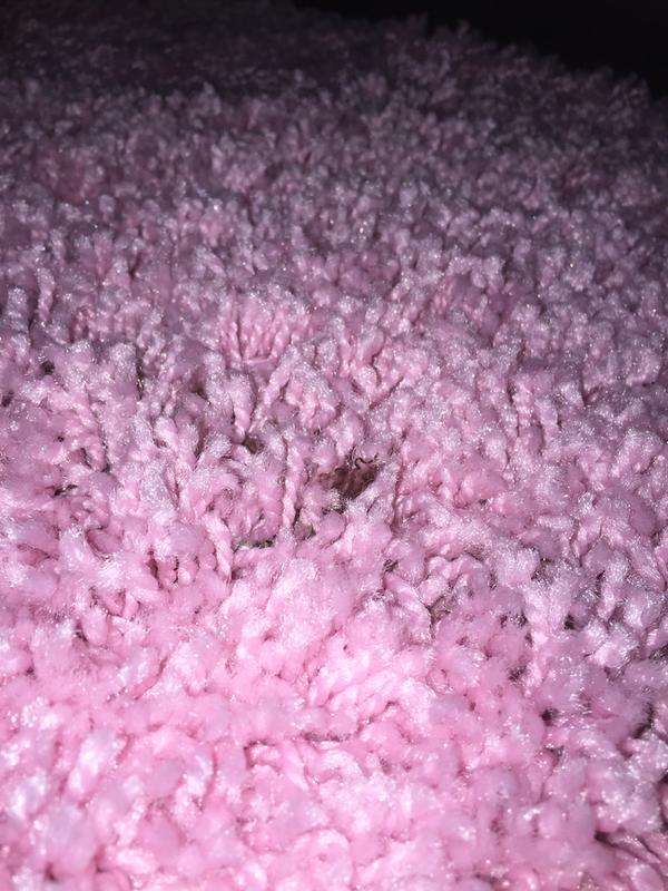 Customer photo for review titled "Pink 6ft x 6ft rug."