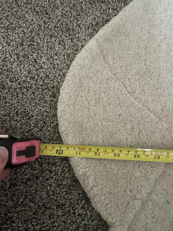 Customer photo for review titled "Beautiful rug for kids room"