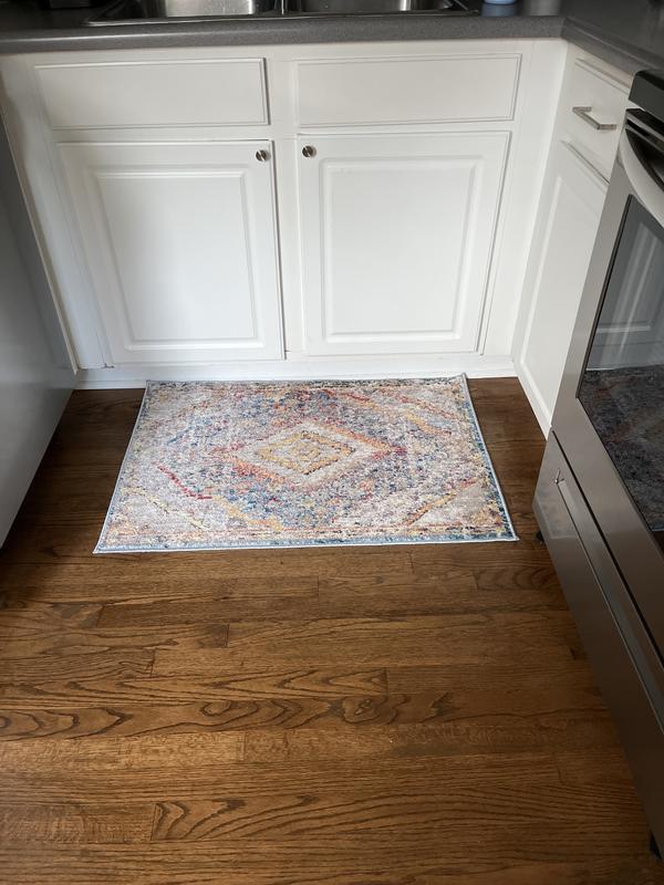 Customer photo for review titled "Tons of color! Very nice rug lots of compliments"